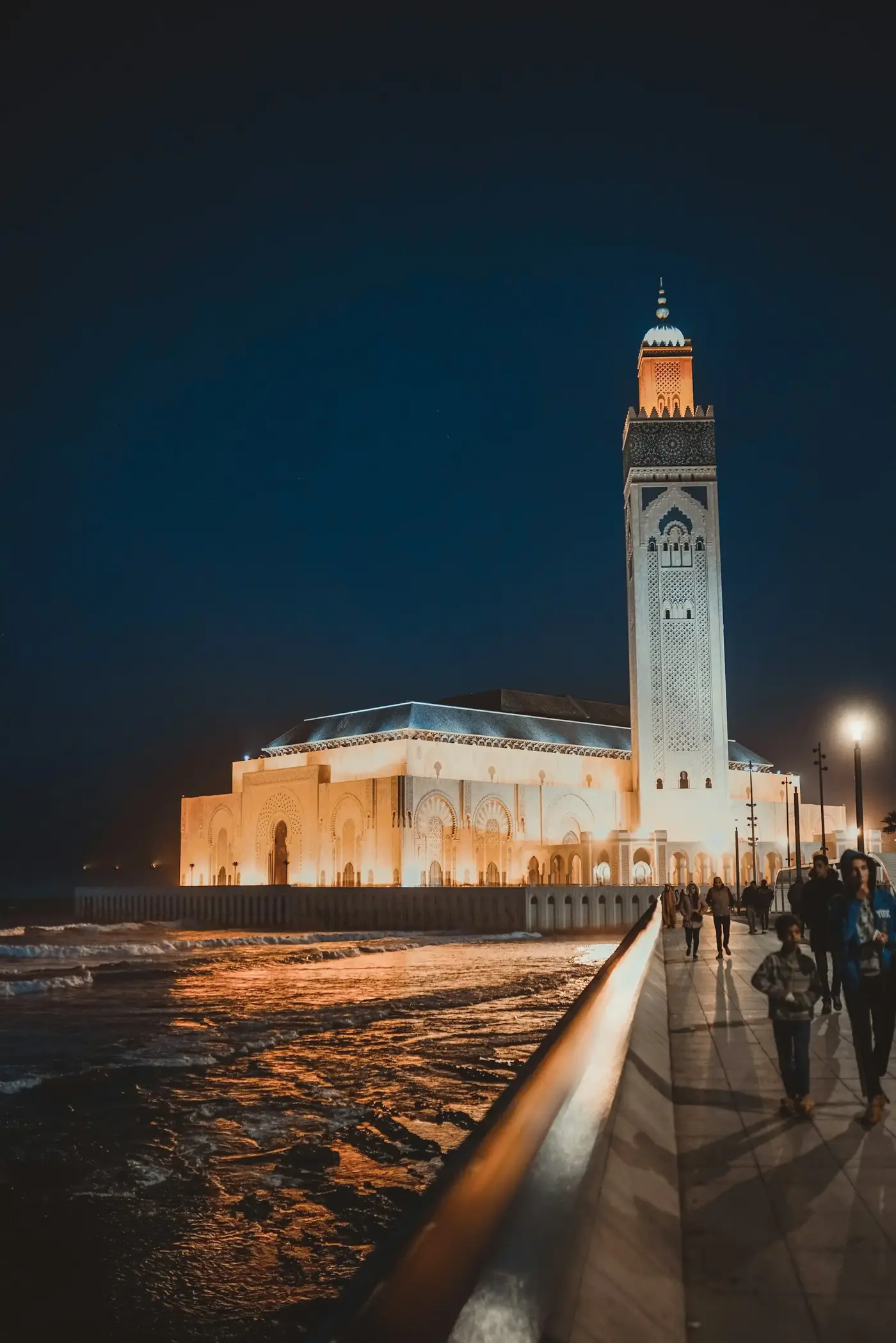 The Hassan II Mosque lit up at night in Casablanca